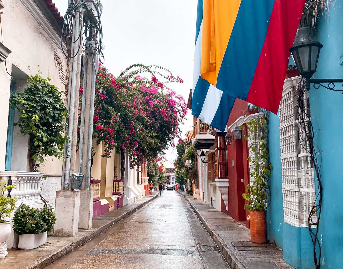 colorful buildings with flowers growing up the facades in Old Town Cartagena, Colombia