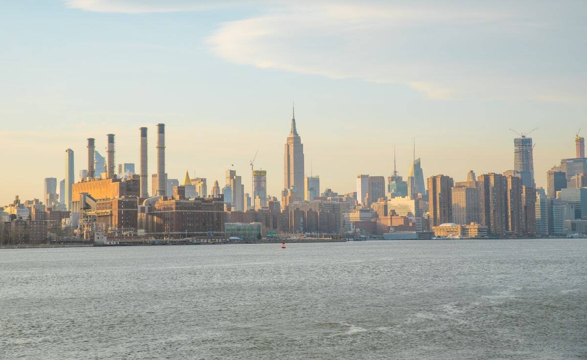 Manhattan skyline view from the Williamsburg waterfront with the Empire State Building in the center